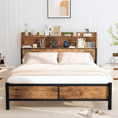 a bed sitting in a bedroom next to a wooden shelf filled with books and other items