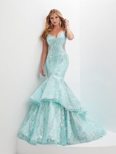 This stunning mermaid gown has a sweetheart neckline with spaghetti straps, a fitted body, and a full double-tiered mermaid skirt with a sweep train, all done in a beautiful pearl, bugle bead and sequin swirl design. Sequin Print Tiered Mermaid Dress by Panoply 14150 Panoply Collection by the House of Wu: Spring 2023 Fabric: Floral Sequins Please note: There may be a loss of sequins while wearing this dress due to the nature of the fabric Colors: Aqua, Royal Blue Sizes Available (as of 12/20/202 Mermaid Evening Gown, Off Shoulder Gown, Prom Style, Dream Wedding Ideas Dresses, Gowns For Girls, Mermaid Skirt, Mermaid Gown, Gowns Of Elegance, Swirl Design