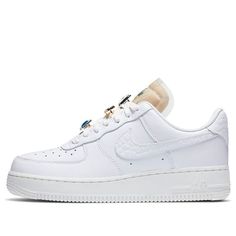 Nike Women Air Force 1 Low 07 LX Bling This AF1 features a white premium leather upper with jewels interwoven in the laces. Tumbled leather material is used on the swoosh and heels completed with a translucent coating on the padded tongues atop a solid white AF1 rubber sole. (AF1/SNKR/Skate/Low Top/Women's/Non-Slip) Nike Air Force 1 White Leather, Nike Air Force 1 White Leather Sneakers, Nike Luxury Leather Sneakers, White Leather Nike Air Force 1, Nike Leather Sneakers With White Laces, Women Air Force 1, White Af1, Nike Air Force 1 Low, Air Force 1 Low