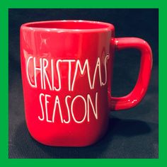 a red coffee mug with the words christmas season written on it