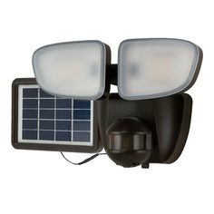 a solar powered outdoor light with two lights on the front and one is turned on