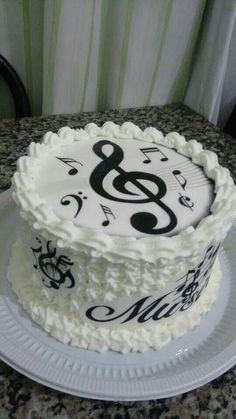 a white cake with music notes on it