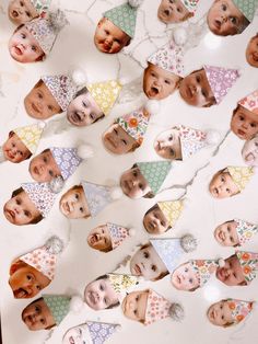 a group of children's faces are shown in the middle of a paper party hat