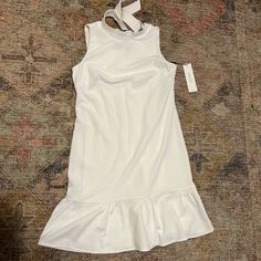 Calvin Klein Simple Cocktail Dress. Standup Collar Halter, Fun Flounce At Hem. Polyester Crepe. Brand New W/Tags. Never Worn. Size 6. Simple Cocktail Dress, Simple Cocktail, Calvin Klein White, Calvin Klein Dresses, Size 6 Dress, Womens Calvin Klein, Calvin Klein, Cocktail Dress, Size 6