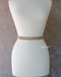 "LISALI Sparkly Wedding Belt, Bling Belts, Rhinestone Belt, Wedding Belts, Bridal Belts, Rhinestone Chain Belt, Crystal Sash Belt Made of - This beautiful sash is made with sparkly rhinestones details, very elegant. - rhinestone part is about 18 -42 inches X 1.2 inch wide (45cm long x 3 cm wide) can me made longer for additional price - satin ribbon - your color choice - 108\" long (2.5 m) , made to tie a bow in the back Sophisticated and elegant bridal belt. Shipment from NY,US.Fast shipping,fa Fitted Gold Sash For Wedding, Wedding Dress Belts, Belt Wedding Dress, Bridal Belts, Dress Belts, Bling Belts, Wedding Belt, Wedding Dress Belt, Sparkly Wedding