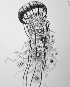 a black and white drawing of a jellyfish with flowers on it's back