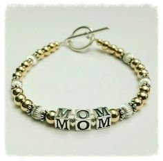 Beaded Mom Name Bracelet, Mothers or Grandmothers Bead Name Bracelet, Gold Filled & Sterling Silver Gold Beaded Bracelets For Mother's Day Gift, Nickel-free Beaded Bracelets For Mother's Day, Gold Bracelet With Letter Beads As Gift For Mom, Gold Round Bead Jewelry As Gift For Mom, Gold Bracelets With Round Beads For Mom, Gold Round Beads Bracelet As Gift For Mom, Handmade Gold Beaded Bracelets As Gift For Mom, Adjustable Gold Beaded Bracelets As Gift For Mom, Gold Bracelet With Round Beads As Gift For Mom