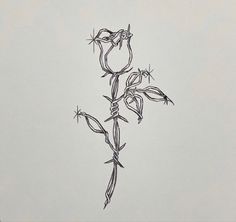 a black and white drawing of a flower