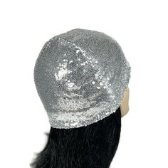 Silver Sequined Beanie Silver Skullcap Sequin Skullcap Glam Skullcap Beanie Sequin Toque Silver Helmet Flapper Sequin Hat Sequin Chemo Hats PLEASE READ COMPLETE LISTING TO GET THE DESIRED FIT New on trend sequin skull cap...FITS TIGHT TO THE HEAD...very flattering. Faux sequin dots are glued to black mesh fabric.  Stretches to fit head circumference. Lined in fabric of your choice, black 100% cotton jersey knit or black silky spandex Casual wear or dressy...have fun with it Measure around the head where you want the brim of the hat to fit.  Skull cap will stretch TIGHTLY to that measurement. If you prefer a looser fit, order a larger size.  Please message me with any questions or concerns. Skull cap measures 7.5-8"  top to bottom edge.  Please message me if you would like it longer. FYI... Adjustable Cap Headpiece For Party, Adjustable Cap Style Headpiece For Party, Party Costume Cap One Size, Party Mini Cap Hat One Size, Party Mini Cap Hat, Adjustable Beanie Costume Hats For Party, Fitted Costume Hats And Headpieces For Winter Festival, Party Mini Cap, Winter Party Beanie Mini Hat