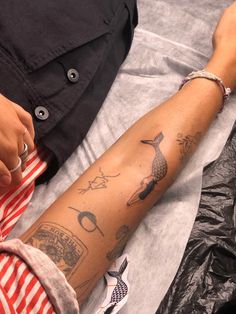 a person with a tattoo on their arm