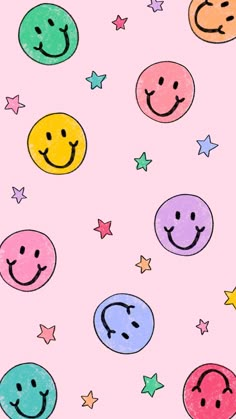 colorful smiley faces and stars on a pink background