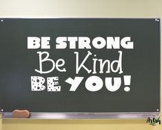 a blackboard with the words be strong and be kind of you written on it