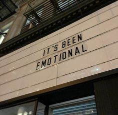 a sign that says it's been emotional on the side of a building