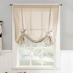 The Lawson tie-up shade from no. 918 adds personality to any window. Ideal for kitchens, bathrooms and other smaller windows, this shade gently filters light while enhancing privacy. Rod pocket design allows for simple slide-through installation on curtain rods up to 1 ½" in diameter.Number of Panels: 1Included: 1 Valance(s)Top Construction: Rod PocketTop Opening: 1 1/2 In Rod PocketUse: IndoorBase Material: 100% PolyesterLining: UnlinedLight Filtration: Light-FilteringCare: Machine WashC Small Bathroom Window Treatments, Curtain Ideas For Kitchen, Small Bathroom Window, Tie Up Valance, Bath Window, Tie Up Curtains, Tie Up Shades, Bathroom Window Curtains, Bathroom Window Treatments