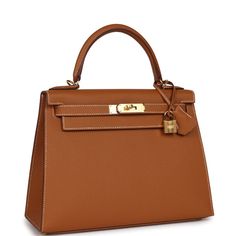 This Kelly, in the Sellier style, is in gold epsom leather with gold hardware and has contrast stitching, front flap, two straps with center toggle closure, clochette with lock and two keys a single rolled handle and removable shoulder strap.The... Hermes Kelly Sellier, Kelly Sellier, Hermes Box, Lv Handbags, Urban Outfits, Street Chic, Lv Bag, Sneaker Head, Urban Fashion