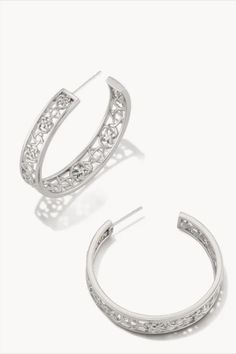 Eye-catching and iconic, the Kelly Hoop Earrings in Silver are the botanical-inspired statement piece you need in your collection. Wear them on their own for a simply stunning look or achieve a more dramatic effect with other trendy statements. Elegant Spring Hoop Earrings, Elegant Metal Hoop Earrings For Spring, Silver Hoop Earrings For Spring, Silver Metal Hoop Earrings For Spring, Spring Silver Metal Hoop Earrings, Silver Kendra Scott, Delicate Necklace, Kendra Scott, Silver Fashion