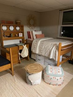 a bedroom with a bed, desk and chair