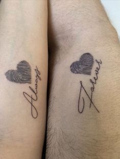 two people with matching tattoos on their legs, one has a fingerprint and the other has a heart