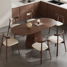 a kitchen table with four chairs and a sink in the corner next to an oven