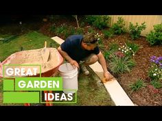 a man is working in the garden with a bucket and pail full of dirt