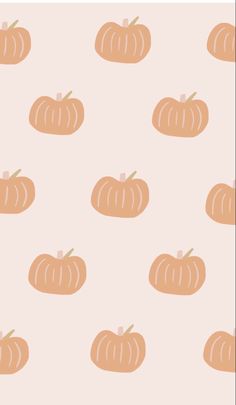 an orange pumpkin pattern on a pink background