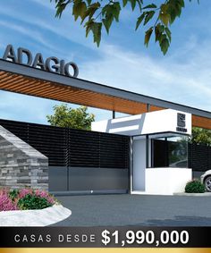 a car is parked in front of a building with a sign that says adago