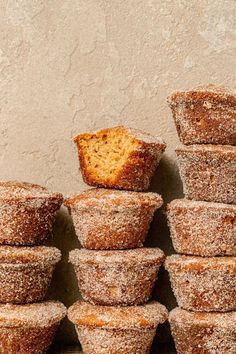 a stack of muffins sitting next to each other on top of a table