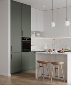 two stools are in front of the kitchen island