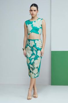 Green sleeveless crop top crafted in silk with gardenia zari applique and inverted V hem detailing. Paired with a matching pencil skirt. - Aza Fashions Chic Silk Sleeveless Crop Top, Chic Sleeveless Silk Crop Top, Elegant Sleeveless Silk Crop Top, Sleeveless Green Floral Print Set, Sleeveless Silk Crop Top For Party, Sleeveless Silk Sets For Spring, Green Floral Print Sleeveless Crop Top, Top With Pencil Skirt, Skirt For Women