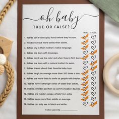 the baby's true or false poem is next to a toy and other items