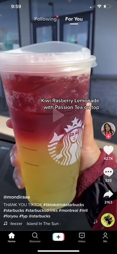 someone holding up a starbucks drink with the caption'kri rasberry lemonade with passion tea on top