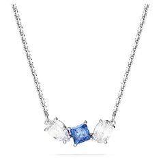 This elegant Mesmera pendant delivers exquisite refinement through its bold mix of cuts and color. Worn on a delicate chain, the rhodium plated design features a trio of prong-set Swarovski Zirconia in varying shapes with a radiant blue central stone. A wondrous gift that will accentuate any style. Swarovski Necklace, Plate Necklace, Blue Pendant, Pierced Jewelry, Delicate Chain, Swarovski Jewelry, Blue Necklace, Accessories Jewelry Necklace, Adjustable Necklace