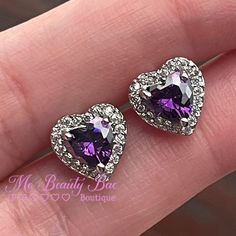 Purple Heart Shaped Stud Earrings Dainty Purple Stud Earrings Surrounded By Cz Crystals In The Shape Of A Heart. Cute Everyday Earrings. Stamped Sterling Silver Posts New To Poshmark? Sign Up Now With My Code: Mobeautybae To Save $10 On Your First Order. Relatable Searches: Purple Earrings, Stud Earrings, Crystal Earrings, Silver Earrings, Heart Earrings, Statement Earrings, Silver Crystal Heart Earrings, Purple Heart Earrings, Silver Heart Charm Earrings With Cubic Zirconia, Silver Cubic Zirconia Heart Charm Earrings, Sterling Silver Heart Earrings For Party, Purple Heart Earrings, Statement Earrings Silver, Purple Stuff, Crystal Heart Earrings, Earrings Heart, Earrings Purple