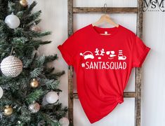 "Santa Squad Shirt, Christmas Squad Shirt, Christmas Shirt, Christmas Gift, Family Christmas, Family Matching Christmas Shirt, Santa Crew 📢Please Check All Photos For Details. 📢Choose Your T-Shirt Size From The Drop-Down Lists Next To The item Picture 📢Choose Of Your T-Shirt Color From The 2nd Picture 📢Use \"Add message to Seller\" link On The Checkout Page To Send me the Following important Details For Your Order's Customization. 📢Shipping Time Varies by location (we are located in Sugar L Christmas Party Shirts, Cute Christmas Shirts, Cheer Shirts, Sugar Land, Christmas Tree Shirt, Santa Shirts, Merry Christmas Shirts, Winter Shirts, Tree Shirt