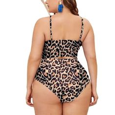 Introducing our "Leopard Print Bikini" - a captivating fusion of style, allure, and comfort meticulously designed for plus-size women who want to make a fashion splash during the summer of 2023. This bikini set is thoughtfully crafted to ensure you not only look your best but also feel confident, sultry, and comfortable as you embrace the sun and surf.The striking leopard print, complemented by the mesh stitching and high waist design, adds a touch of exotic charm and sophistication to your swim Leopard Print Swimsuit, Sheer Swimsuit, Swimsuits High Waisted, Swimsuit Set, Print Swimsuit, Swimsuit Fashion, Swimwear Collection, Olivia Mark, Halter Neck