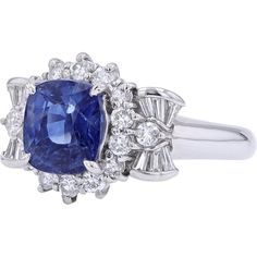 Immerse in the aura of opulent allure with this exquisite PT900 sapphire halo ring, where the rich blue hues of the 2.92-carat center sapphire captivate and enchant. This remarkable gemstone is masterfully set in a luxurious platinum band, creating a timeless piece that exudes sophistication and grace. The cushion-cut sapphire, with its deep and mesmerizing color, is surrounded by a halo of sparkling diamonds, totaling 0.72 carats, enhancing the overall brilliance and elegance of the ring.Each diamond is meticulously chosen for its clarity and sparkle, providing a stunning contrast to the vivid sapphire and adding a layer of scintillating beauty. The platinum setting offers a sturdy yet elegant frame, ensuring the longevity and durability of this fine piece while maintaining a sleek and po Platinum Halo Ring, Platinum Sapphire Ring, Sapphire Halo Ring, Sapphire Birthstone, Diamond Accent Ring, Elegant Frame, Sapphire Diamond Ring, Elegant Ring, Sapphire Jewelry