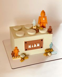 there is a cake made to look like a lego man