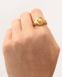 This ring features a large round signet with an artistically wavy surface, indicating the ups and downs during the long journey of life. The subversive yet minimalistic vibe blends a statement of confidence for you. Whenever you have a glance at it, it will always remind you that - face the obstacle that comes and goes, feel the changes, and embrace them with no fear anymore.

Band Width: 14mm
Band Thickness: 1.8mm
Material: 18k Gold Plated On Brass Wavy Ring, The Longest Journey, Journey Of Life, Long Journey, Come And Go, Ups And Downs, Signet Ring, Ups, Gemstone Rings