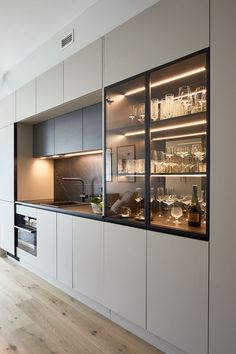 the kitchen is clean and ready to be used for dinner or wine tasting in someone's home