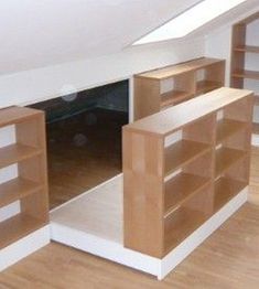 there are shelves in the room with no doors or drawers on each shelf and one is empty