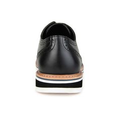 A dress shoe that combines high-style with all-day comfort, the Warrick by Vance Co. A wingtip accent and a contrasting textured design enhanced with brogue details tops this lace-up derby. Smooth vegan leather, a lightweight EVA outsole, and a 4 mm memory foam footbed provide superior support. Black Wingtip Dress Shoes With Perforated Toe Box, Casual Black Dress Shoes With Brogue Detailing, Black Wingtip Oxfords With Perforated Toe Box, Black Wingtip Oxfords For Spring, Black Oxfords With Contrast Sole For Spring, Black Oxfords With Contrast Sole For Work, Black Wingtip Dress Shoes For Office, Black Wingtip Oxfords For Office, Black Oxfords For Spring Workwear