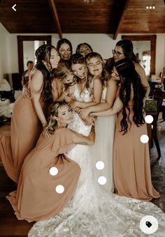 a group of bridesmaids hugging each other