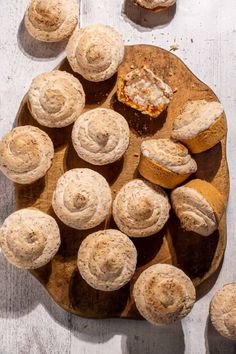 Hertzoggies on a wooden board on a white background. Coconut Tartlets, Coconut Meringue, Cape Malay, Meringue Topping, Bunny Chow, Milk Tart, Mini Tart Pans, Baking Recipes Cookies, Mini Tart