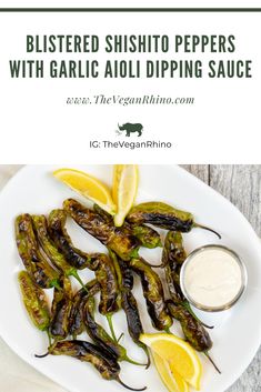 grilled shishito peppers with garlic aioli dipping sauce on a white plate