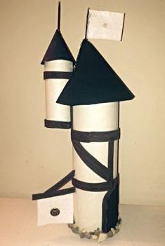 a white and black castle made out of cardboard