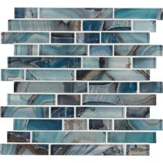 blue and brown glass mosaic tile with white border in an irregular pattern on the wall