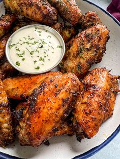 chicken wings with ranch dressing on a plate