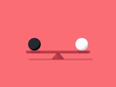 two balls sitting on top of a seesaw with one ball in the middle, and another