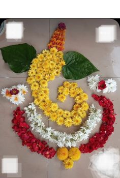 flowers arranged in the shape of a letter