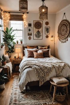 a bed room with a neatly made bed and lots of hanging decorations on the wall